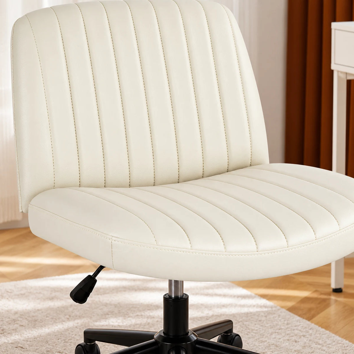 Close view of the beige PU chair seat and channel stitching